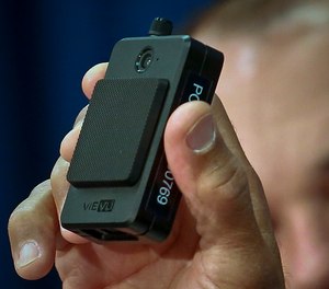 A newly issued police body camera is shown during a NYPD news conference in New York