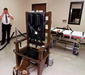 The Tennessee Department of Correction fired its top attorney and another employee following a report on lethal injection policy failures.