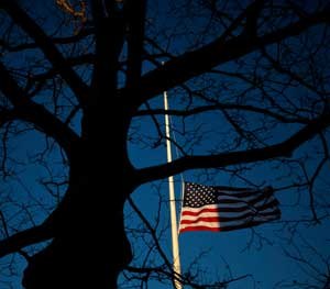 In memory of the victims at Sandy Hook, the flag is half-staff.