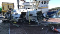 Report on fatal Alaska air ambulance crash suggests crew unbuckled their safety restraints