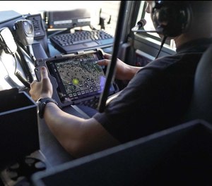 LaunchPort Rugged System by iPort secures and protects an iPad in a fire apparatus