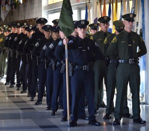 Recruits line up at the start of Orange County Sheriff’s Regional Training Academy’s Class of 239 Graduation Ceremony.
