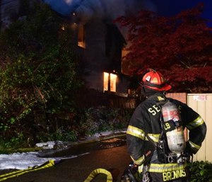 Firefighters are trained to size-up a structure to make a go/no-go decision as to whether to enter a burning building. (Photo/John Odegard)