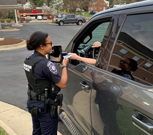 In Warrenton, Virginia, the police department has implemented a program where citizens are asked to provide an immediate (anonymous) rating for every single police encounter. Here Officer Johnna Sylvester provides the “report card” to a citizen she stopped.