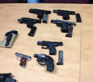 The wanted felon had these guns in his possession when he violently assaulted Detective Mario Oliveira.