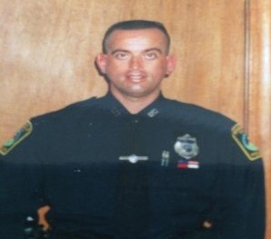 Pictured here is Detective Mario Oliveira who survived being shot at point blank range in his arm, his chest and his stomach.