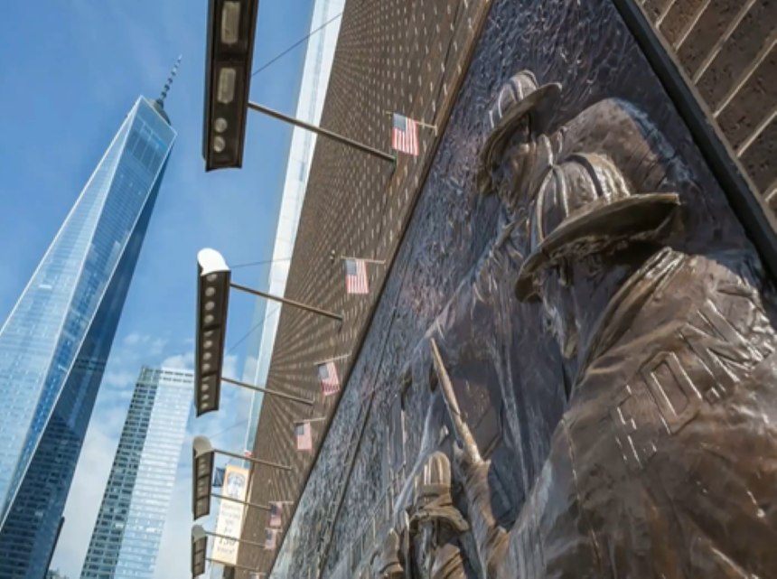 A view of One World Trade Center from a firefighter memorial in New York City.