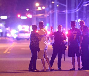 A gunman killed 49 people and injured dozes more at the Pulse Orlando nightclub. (AP Photo/Phelan M. Ebenhack)
