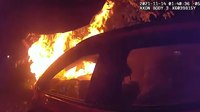 Watch: Atlanta cops pull unconscious man from burning car