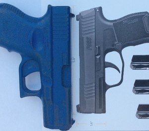 The P365 offers an overall length that is substantially shorter than other pistols in this category. A Glock 26 replica is shown for comparison.