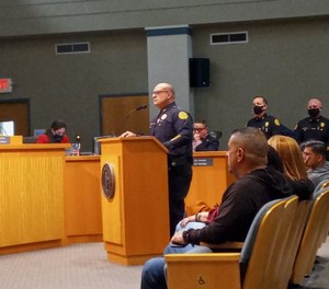 Then-assistant police chief Manny Morales speaks at a Miami city meeting on Oct. 1, 2021.
