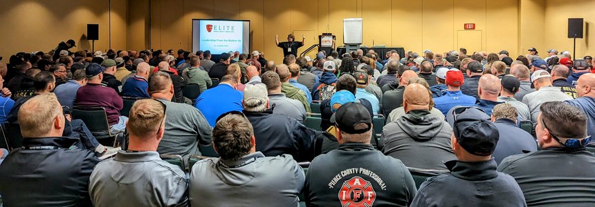 To a packed room, Indianapolis Battalion Chief Dr. Candance Ashby presents "Leadership from the Bottom Up" at FDIC 2023.