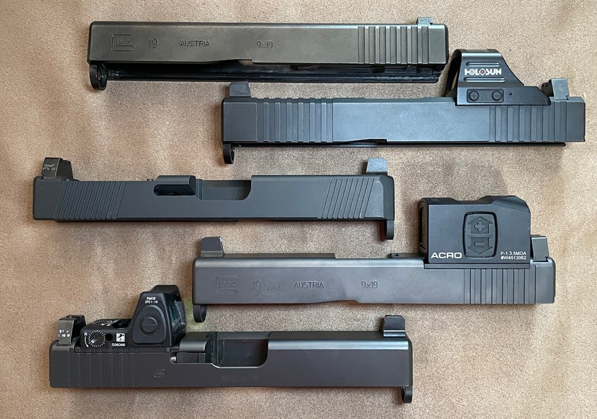 Top to bottom: Factory Gen 3 slide, Brownells slide with RMR cut, Swenson slide with a Vortex Viper cut, Gen 4 MOS with Aimpoint plate, Gen 4 MOS with Glock RMR plate. Note the suppressor-height sights that allow co-witnessing of the RDS. (Photo/Ron LaPedis)