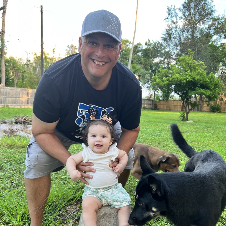 Chief Flores and his seven-month-old granddaughter Layla.