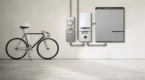 Photo 1: A typical residential system in the garage area with battery storage and shutoffs.