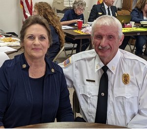 Cramer with her husband, who left the fire service with 38 years of structural and wildland firefighting and EMT-B experience, first as a career firefighter/EMT and then as a volunteer.