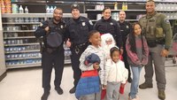 Photos: How police officers are giving back to their communities this holiday season