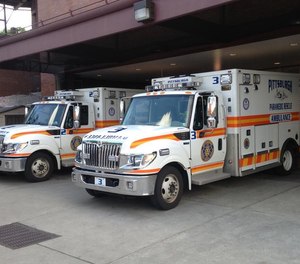 A man was arrested early Friday after Pittsburgh police said he stole an ambulance while paramedics were treating a patient.