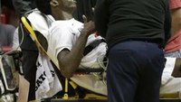 College basketball player collapses during game 