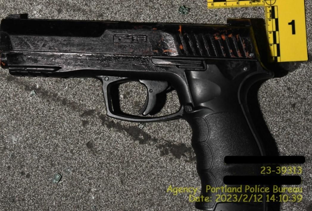 Black replica gun made to look like a real semiautomatic handgun.