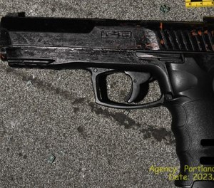 Black replica gun made to look like a real semiautomatic handgun.