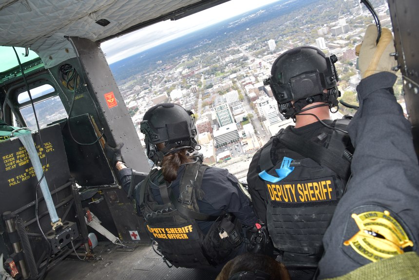 SRT operators during a flight aboard RCSD’s UH-1H helicopter over Columbia, S.C., March 19.