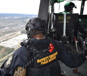 SRT operator and RCSD Aviation Unit co-pilot during a flight aboard RCSD’s UH-1H helicopter over Columbia, S.C., March 19.