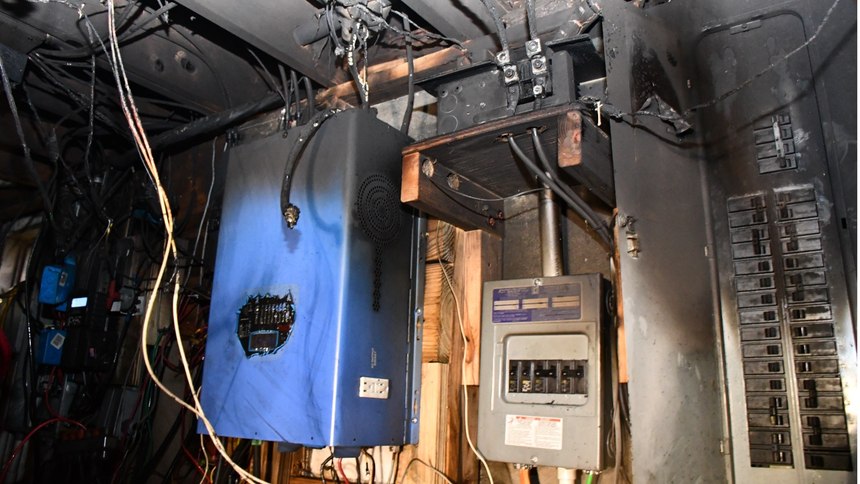 Photo 3: Breaker panels and inverter/converter.