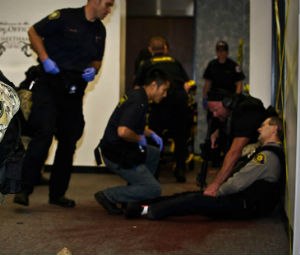 Rescue Task Force medics treat a victim at the point of wounding during an Urban Shield scenario.