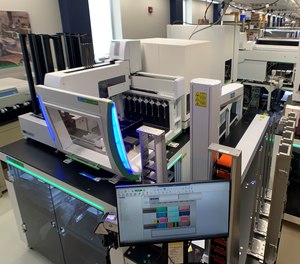 A fully automated nucleic acid extraction workstation at Rutgers’ RUCDR Infinite Biologics can process up to 10,000 saliva samples per day for SARS-CoV-2 coronavirus testing.