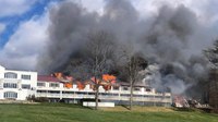 Guests scramble from third- to second-floor decks to escape N.H. resort fire