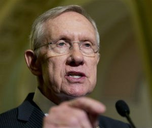 In this Nov. 18, 2014 file photo, Senate Majority Leader Harry Reid, D-Nev. speaks during a news conference on Capitol Hill in Washington. Reid was hospitalized after suffering an injury while exercising in his Nevada home. His office says Reid broke a number of ribs and bones in his face. The injury occurred when a piece of equipment Reid was using to exercise broke, causing the senator to fall.