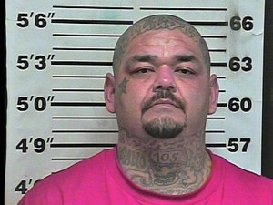 Reimundo Cuevas turned himself in about 1:30 p.m. Sunday after a warrant for his arrest was issued Friday.