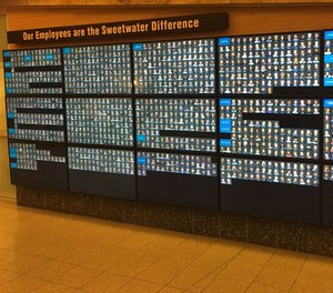 Sweetwater displays an array of photos with a heading “Our Employees Are the Sweetwater Difference.” (Photo/Robert Rielage)