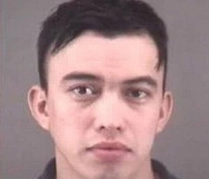 Jose Duran Romero, 27, allegedly crashed his Honda Accord into the side of a Mercedes Lifecare Ambulance. (Photo/Winston-Salem Police Dept.)
