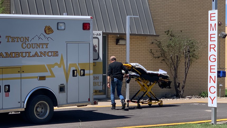A Teton County EMS volunteer wheels a stretcher into Benefis Teton Medical Center in Choteau, Montana, on June 1.