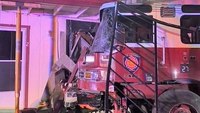 Texas fire engine struck, smashes into apartment complex