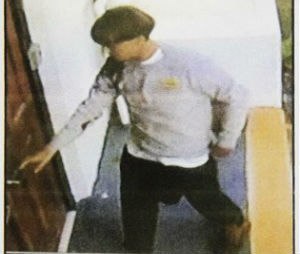 Images on a flier provided to media, Thursday, June 18, 2015, by the Charleston Police Department show surveillance footage of a suspect wanted in connection with a shooting Wednesday at Emanuel AME Church in Charleston, S.C. (Courtesy of Charleston Police Department via AP)
