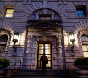 A man walks up the steps of the 9th U.S. Circuit Court of Appeals building in San Francisco.