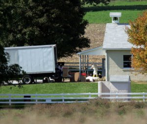 Demolition workers remove debris from the West Nickel Mines Amish School after demolition crews razed the schoolhouse before dawn in Nickel Mines, Pennsylvania, Thursday, October 12, 2006. (Barbara L. Johnston/Philadelphia Inquirer/MCT)