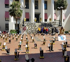 Each set of boots represented a Florida firefighter that is battling or lost a battle with cancer due to hazards in the fire industry.