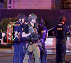 Police officers and medical personnel respond to the scene of the 2017 Las Vegas shooting.