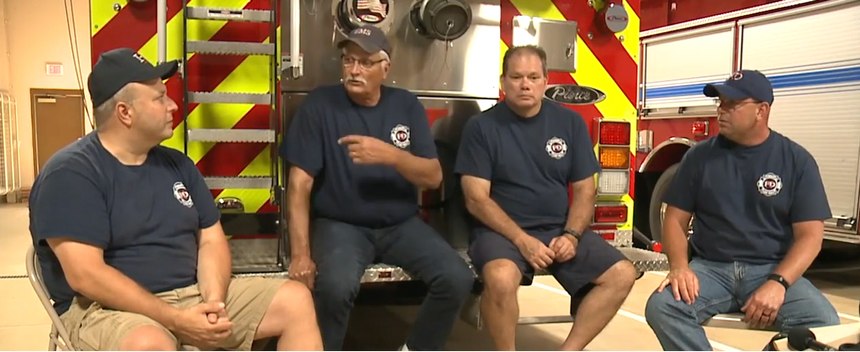From left to right: Bob Stanczyk, Jeff Walczak, Tony Scholten and Chief Mark Chesak discuss the fateful incident.