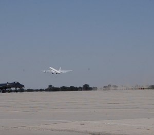 The NASA DC-8 airplane, equipped with scientific instruments, travels through wildfire smoke so scientists can photograph, measure and collect data.