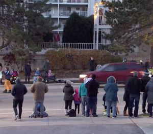 A video posted on Twitter showed a speeding red SUV careening alongside marchers and barely missing a child.