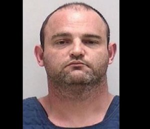 Firefighter Cary Wolf is facing 16 felony charges after officials say he burglarized a home before setting it on fire. (Photo/Georgia Department of Insurance)