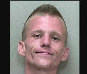 Caycey Donivan Douglass Dicks, 25, was sitting on the side of a highway when a Marion County sheriff's deputy made contact with him. (Photo/Marion County Jail)