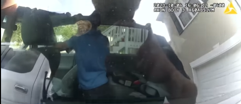 Video Ga officers break window to rescue boy 4 locked in hot car