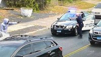 Surveillance video shows armed man raise gun, shoot at Conn. officer point-blank