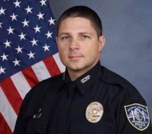 Officer Anthony Christie was inside his vehicle, which was parked crossing the lanes of traffic, when a tractor trailer struck his vehicle from the passenger side.
